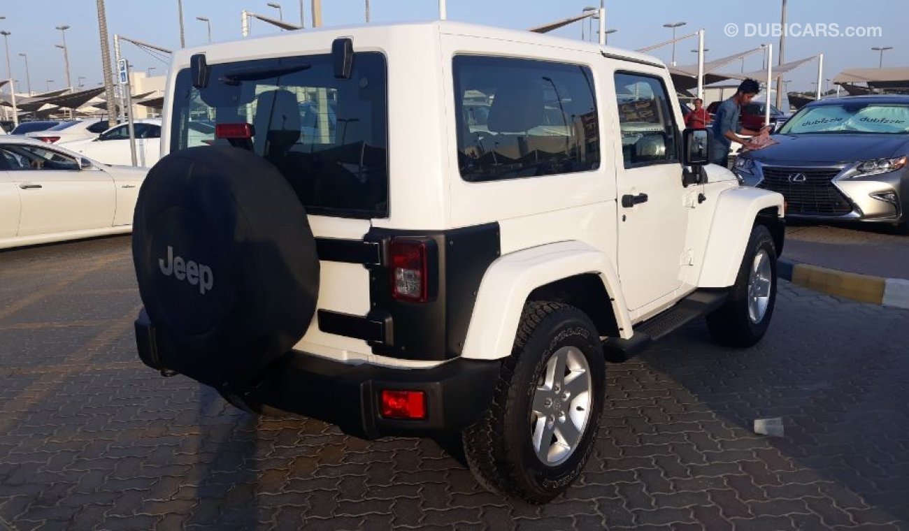 Jeep Wrangler 2013 Sahara Sport edition  Gulf specs Low mileage clean car new tyers Full service Agency