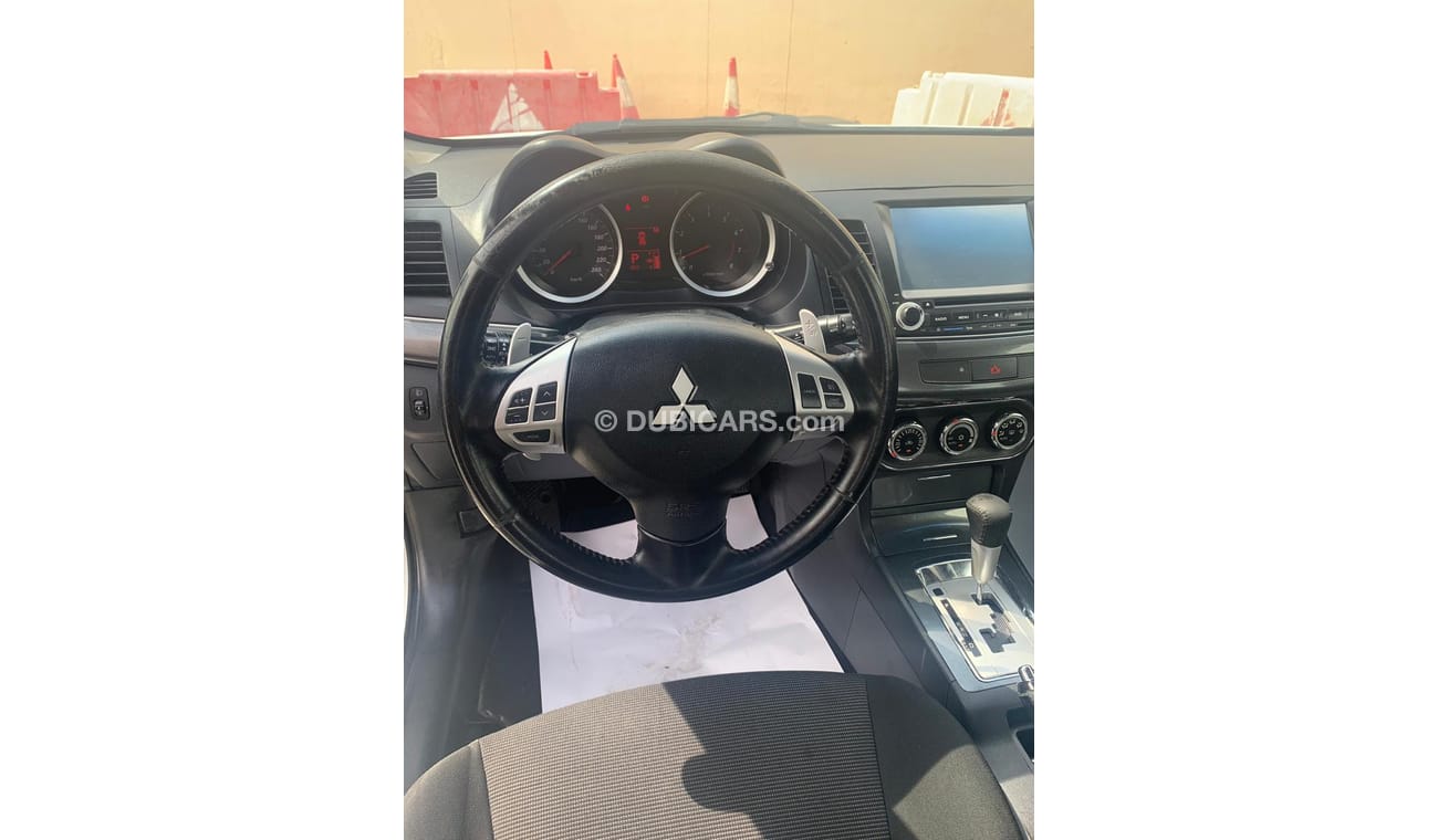 Mitsubishi Lancer URGENT! Lancer GT 2010 Modified with Evo kit and BBS rims