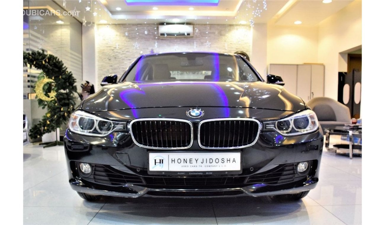 BMW 320i AMAZING BMW 320i 2013 Model!! in Black Color! GCC Specs