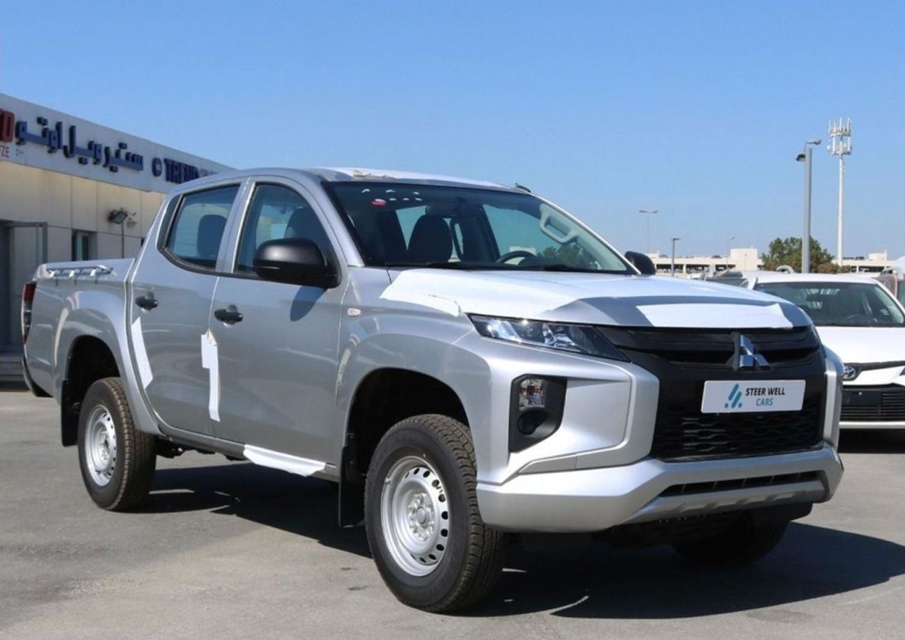 ميتسوبيشي L200 DIESEL - 2.4L -  DOUBLE CABIN - 4X4 - 5MT - POWER LOCKS AND POWER WINDOWS - EXPORT ONLY