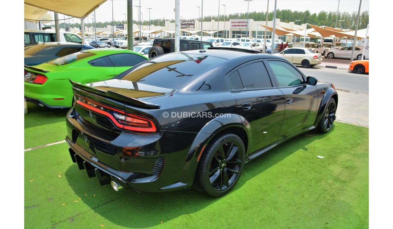 Dodge Charger 3.6L SXT (Mid) OFFER ONE WEEK//CHARGER SRT KIT//WIDE BODE//SUN ROOF//AIR BAGS/