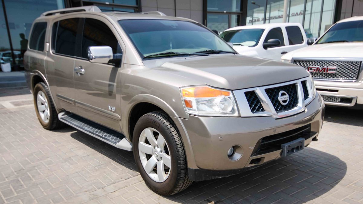Nissan Armada LE for sale AED 33,000. Brown, 2009