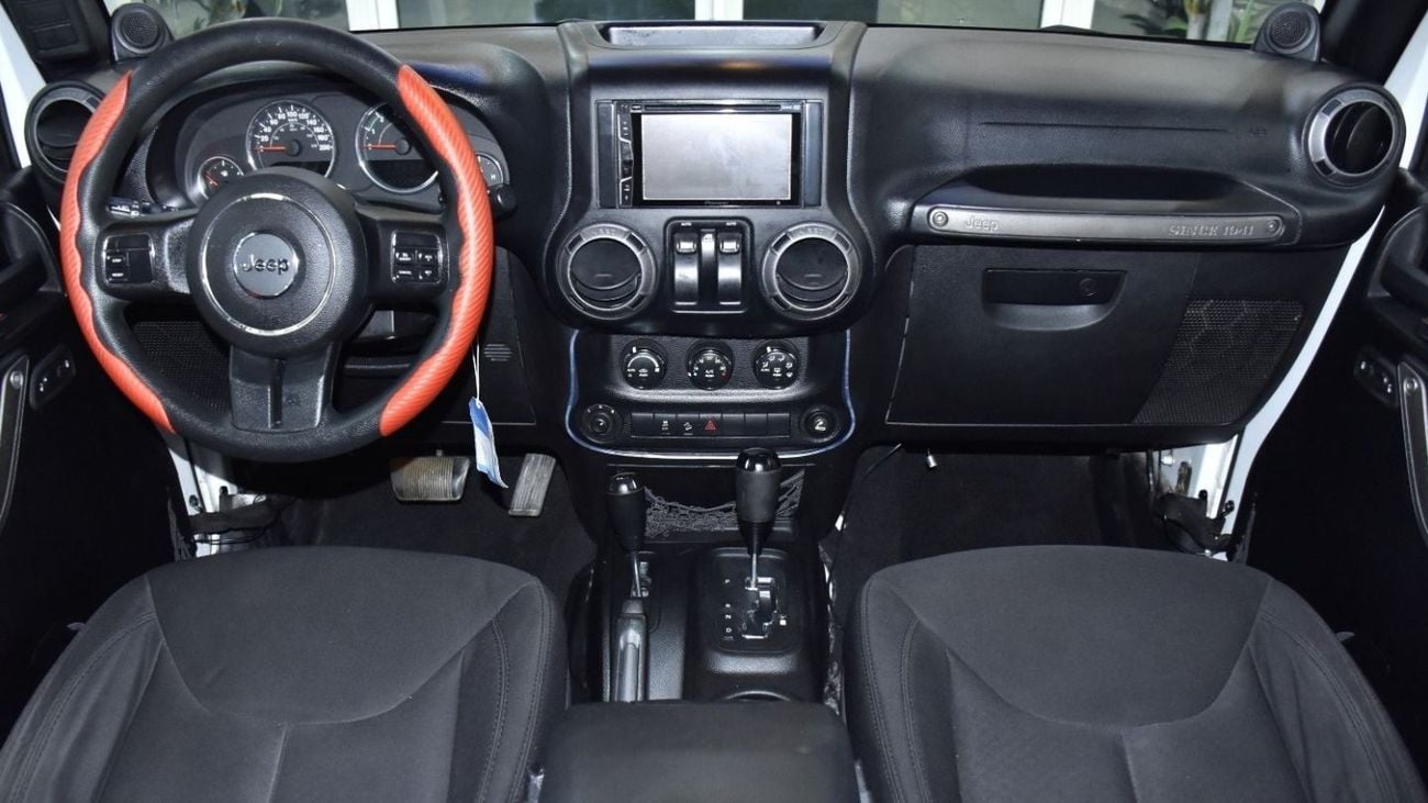 Jeep Wrangler EXCELLENT DEAL for our Jeep Wrangler Sport ( 2014 Model ) in White Color GCC Specs