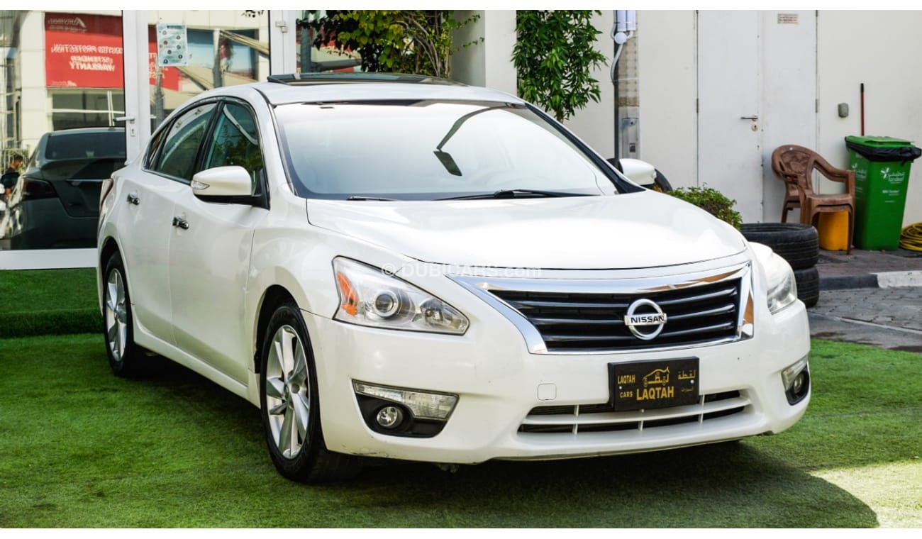 Nissan Altima White color inside Big Ward No.1 fingerprint slot, leather alloy wheels, camera screen control senso