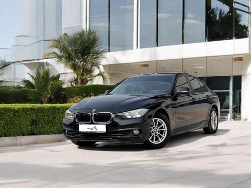 BMW 318i Exclusive 1.5LAED 810 PM | BMW 318i 1.5 I4 RWD| GCC | WELL MAINTAINED | 0% DOWNPAYMENT |FUEL ECONOM