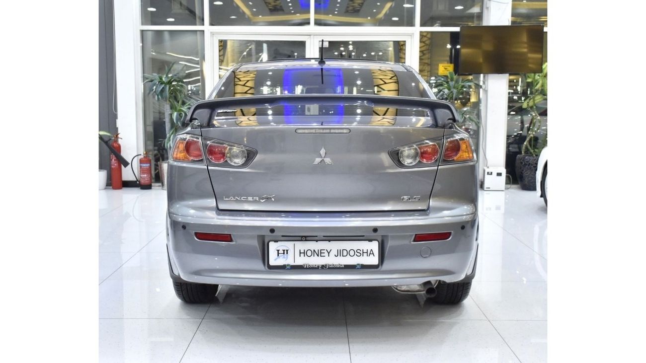 Mitsubishi Lancer EXCELLENT DEAL for our Mitsubishi Lancer GLS ( 2016 Model ) in Silver Color GCC Specs