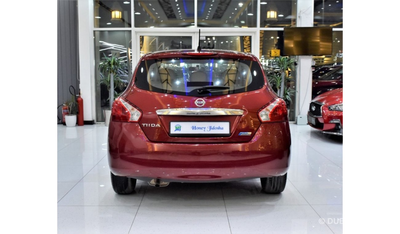 Nissan Tiida EXCELLENT DEAL for our Nissan Tiida ( 2014 Model ) in Red Color GCC Specs