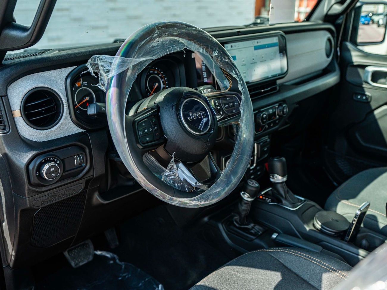 Jeep Wrangler AED 3,538 PM • ALL NEW 2024 WRANGLER UNLIMITED SPORT • BLACK OPS EDITION • JEEP WARRANTY+SERVICE PLA