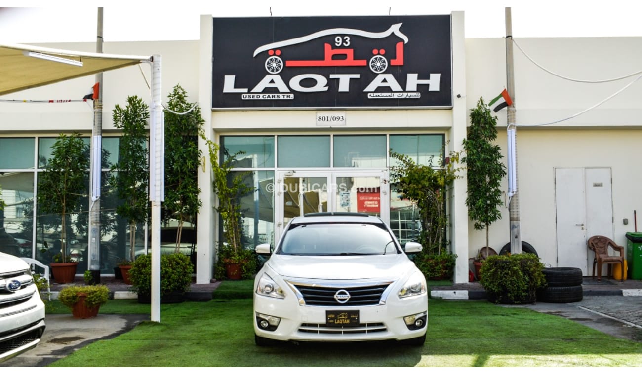 Nissan Altima White color inside Big Ward No.1 fingerprint slot, leather alloy wheels, camera screen control senso