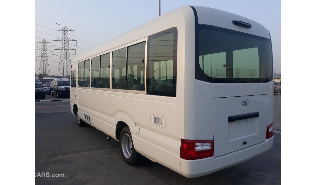 Toyota Coaster DIESEL 4.2L WITH AIR BAGS ABS AND POWER DOOR