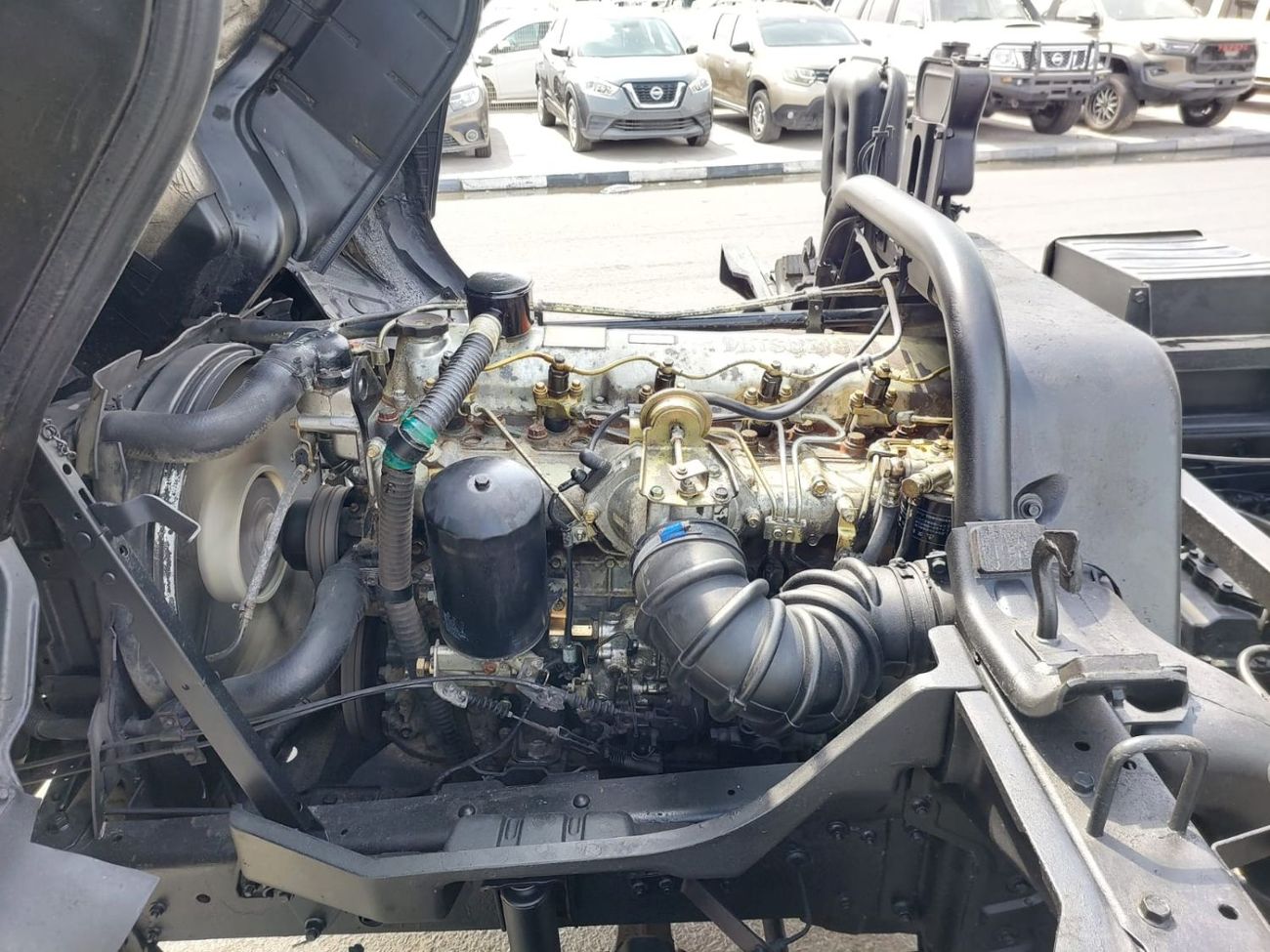 ميتسوبيشي فايتر (RAMADAN OFFER) MITSUBISHI FIGHTER TRUCK RHD 1989 MODEL 6.5 L DIESEL MANUAL(PM30989)