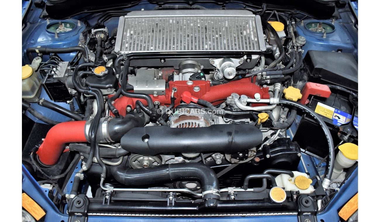 Subaru Impreza WRX EXCELLENT DEAL for our Subaru WRX STi AWD ( 2011 Model ) in Blue Color GCC Specs