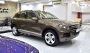 Volkswagen Touareg SEL EXCELLENT DEAL for our Volkswagen Touareg ( 2015 Model ) in Brown Color GCC Specs
