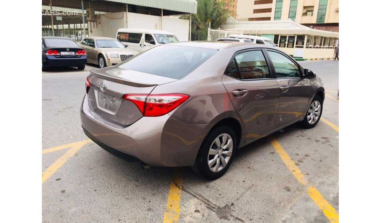 Toyota Corolla 2015 Passing From RTA Dubai for Urgent SALE