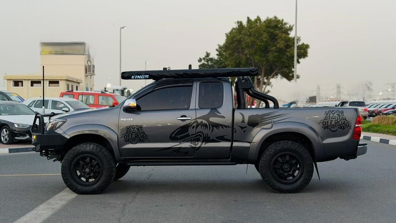 تويوتا هيلوكس 2015 | 3.0 DIESEL ENGINE | MT | RHD | BULL BAR WITH LED LIGHTS | ROOF RACK WITH SIDE AWNING CAMPING