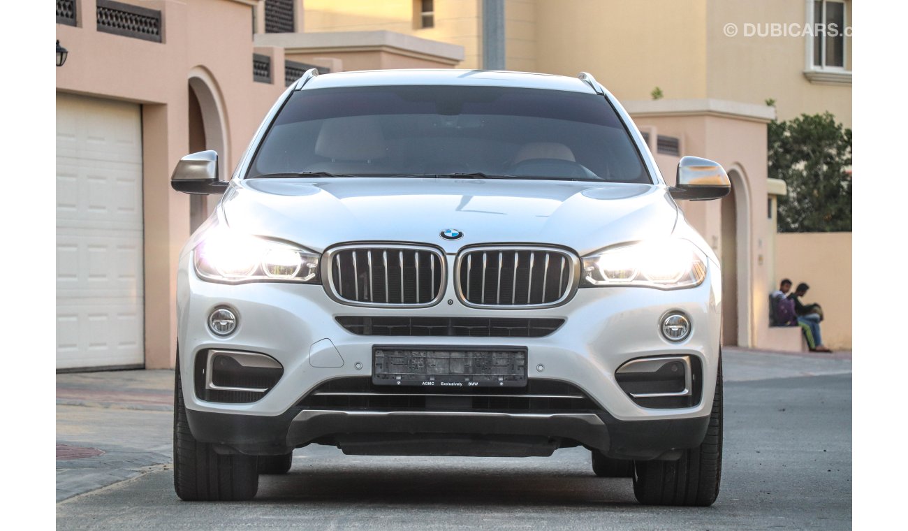 BMW X6 X-Drive 50i 2016 GCC under Warranty with Zero downpayment.