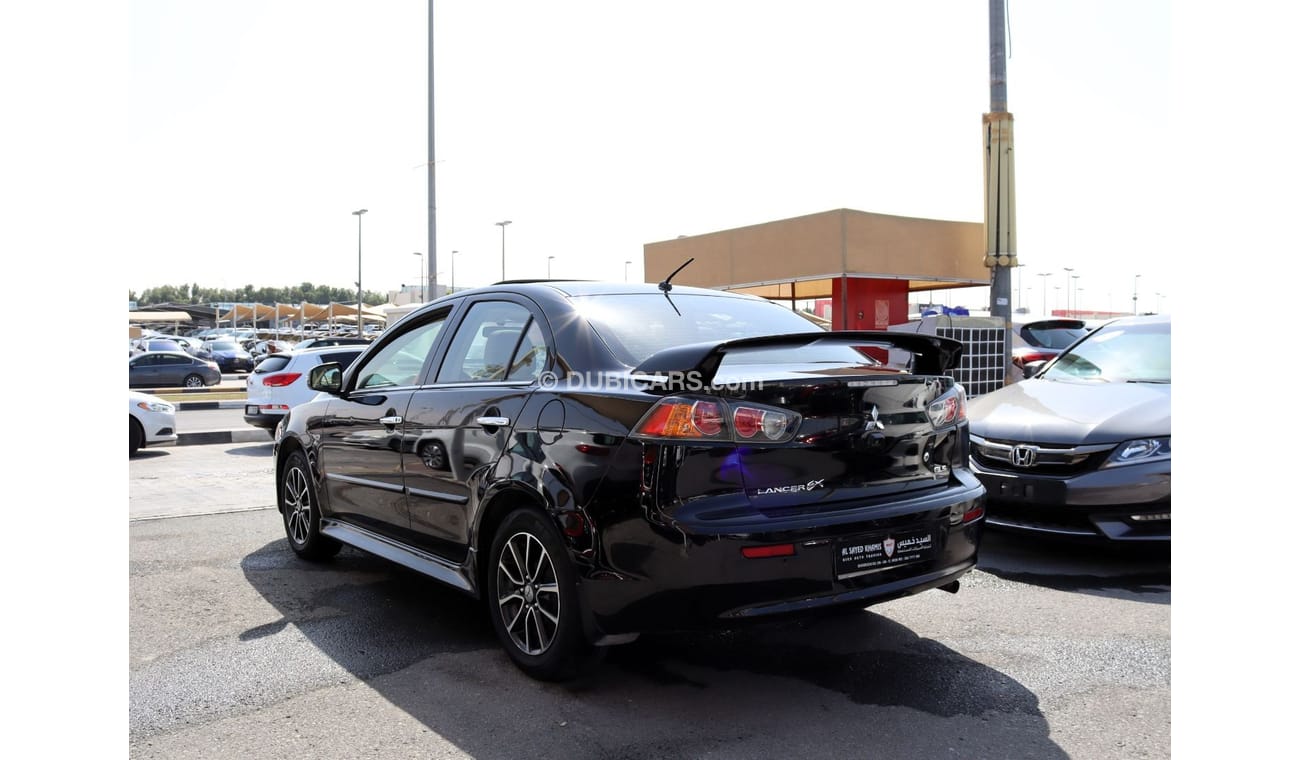 ميتسوبيشي لانسر GLS هاي خالية من الحوادث - خليجي - مكينة 2000 سي سي - رقم واحد - السيارة بحالة ممتازة من الداخل والخ