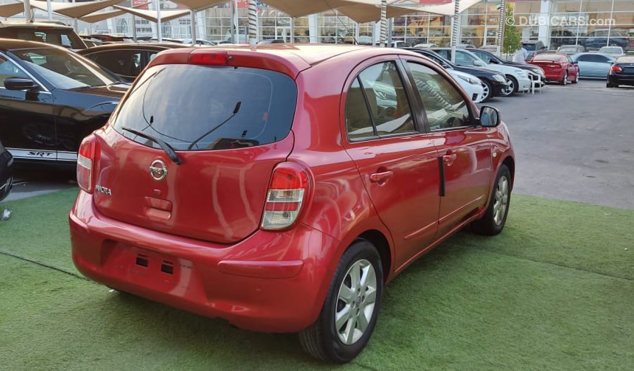 Nissan Micra Gulf number one, without accidents, fingerprint rings, sensors, back wing, electric glass, control m