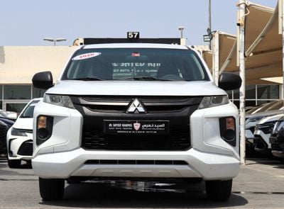 ميتسوبيشي L200 GL خالية من الحوادث - خليجية - دفع ثنائي - حالة ممتازة من الداخل والخارج