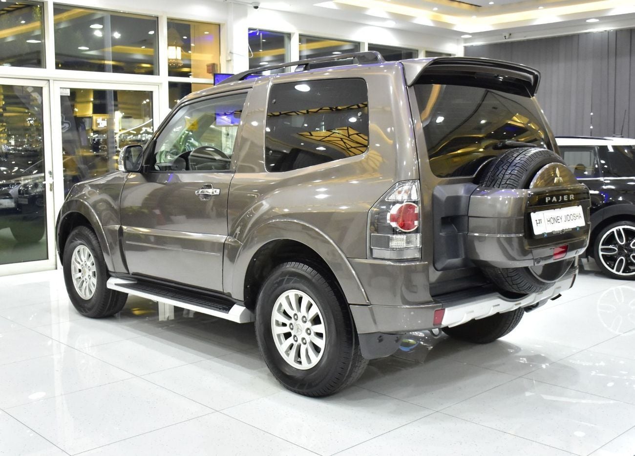 Mitsubishi Pajero EXCELLENT DEAL for our Mitsubishi Pajero GLS 3 Doors ( 2014 Model ) in Brown Color GCC Specs