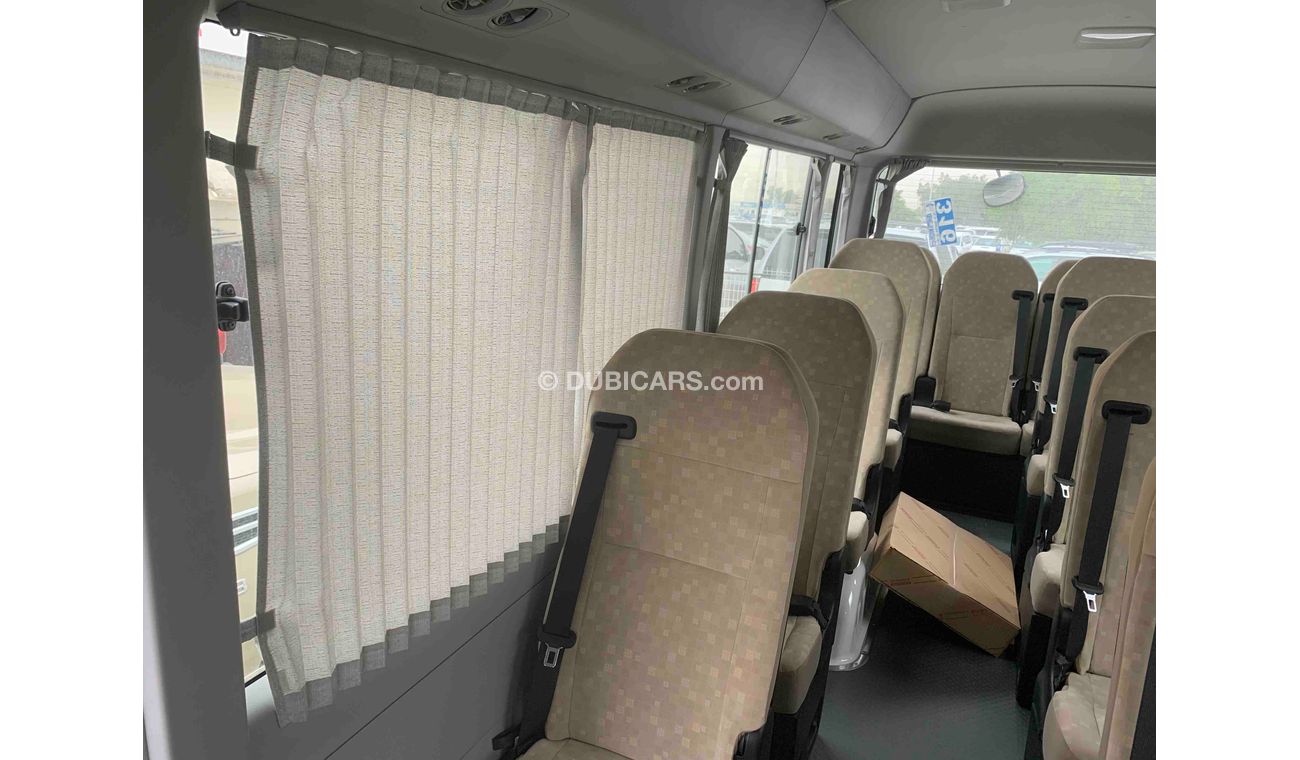 Toyota Coaster FULL OPTION — V6 — 4200cc — DIESEL—22 SEAT -- 3 POINT SEAT BILT - LUGGAGE RACK - CURTAINS - FRIDGE