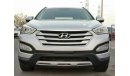 Hyundai Santa Fe 2.4L, 18" Rims, Active ECO Control, DRL LED Headlights, Leather Seats, Dual Airbags (LOT # 1704)