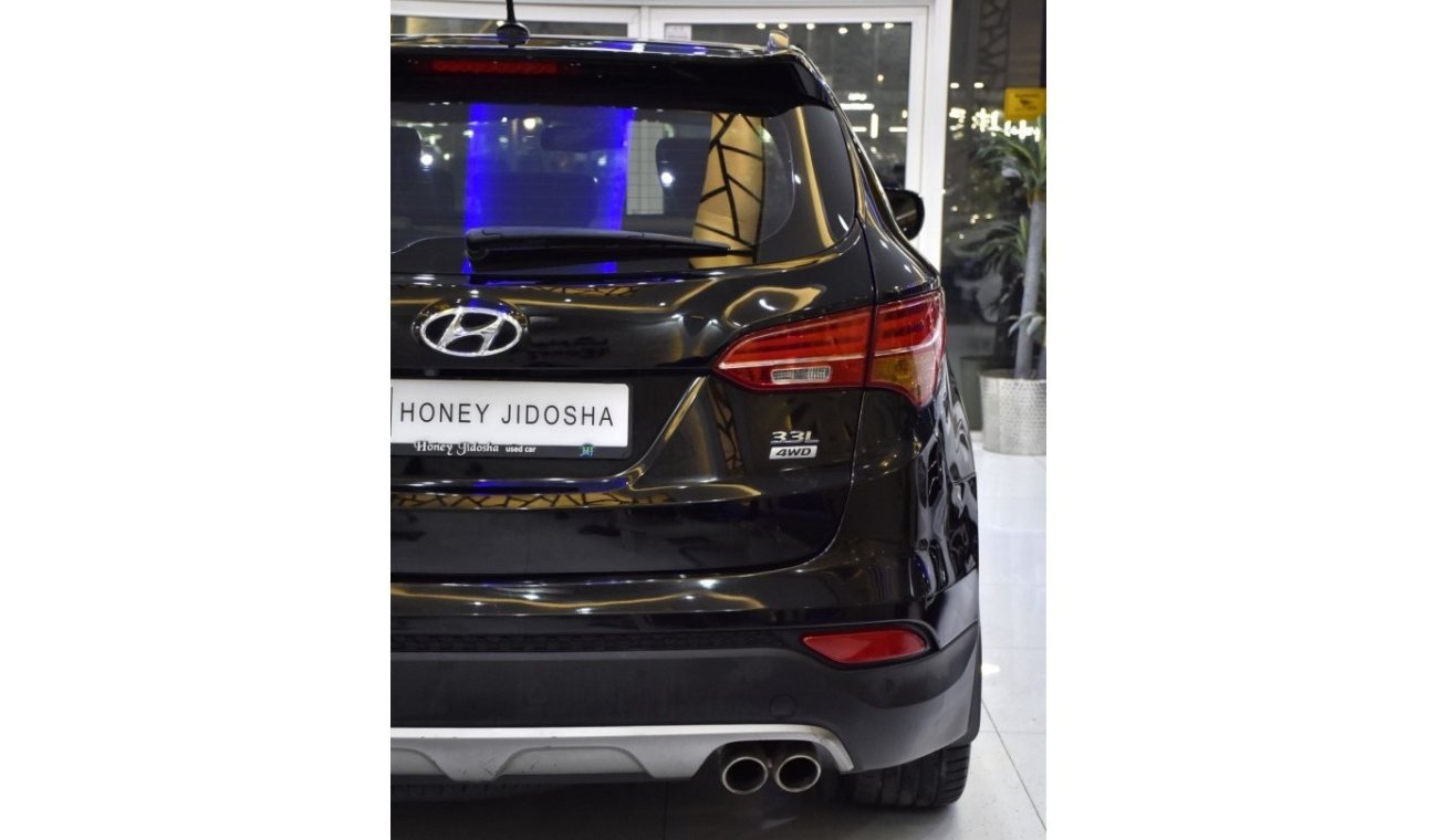 Hyundai Santa Fe EXCELLENT DEAL for our Hyundai SantaFe 4WD ( 2014 Model ) in Black Color GCC Specs