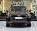 Volkswagen Touareg SEL EXCELLENT DEAL for our Volkswagen Touareg ( 2015 Model ) in Brown Color GCC Specs