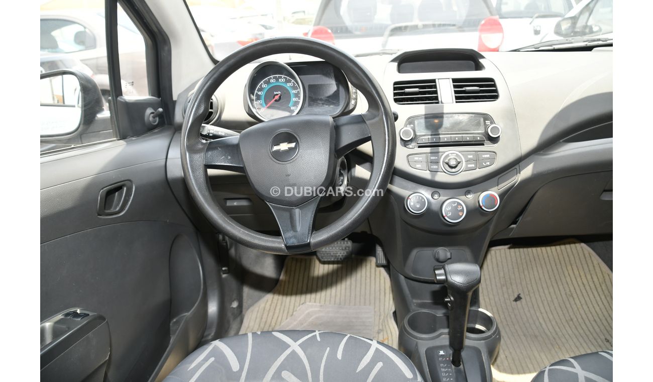 شيفروليه سبارك شيفولية سبارك 2014 ابيض خليجى بدون حوادث بدون صبغ بحالة ممتازة ماشية قليل