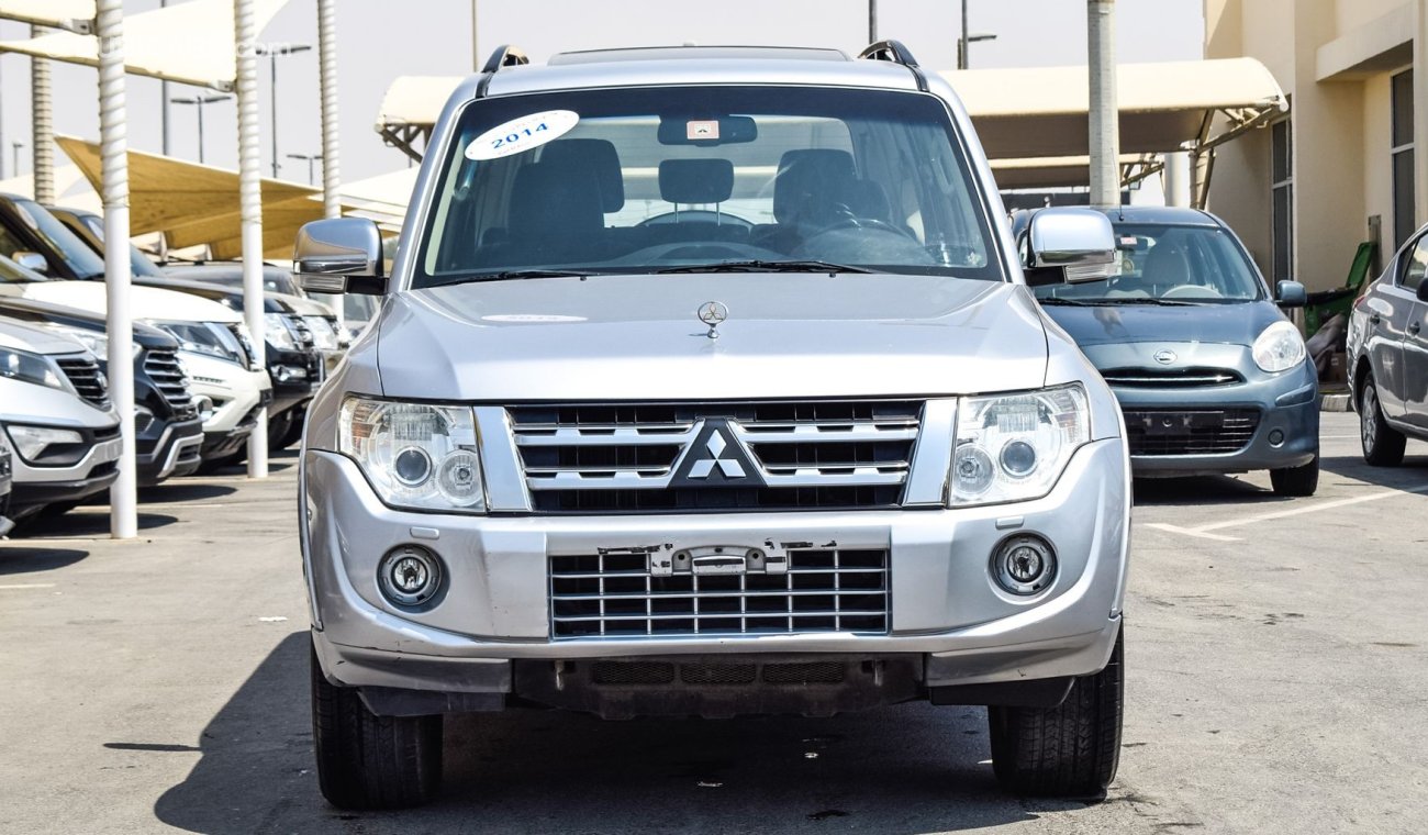 Mitsubishi Pajero Pre-owned Mitsubishi Pajero GLS V6 for sale in Sharjah. Grey/Silver 2014 model, available at Wael Al