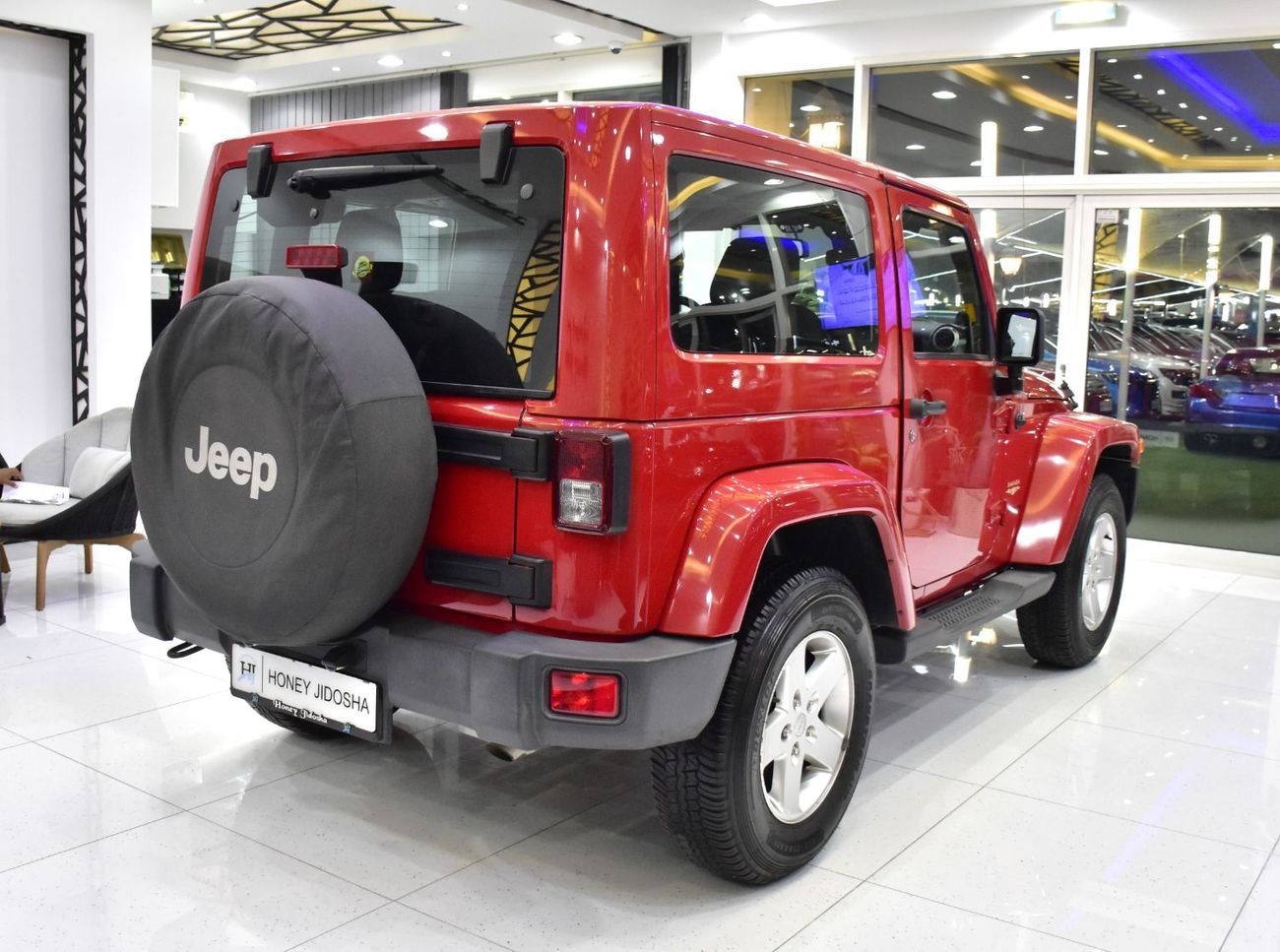 Jeep Wrangler EXCELLENT DEAL for our Jeep Wrangler Sahara ( 2014 Model ) in Red Color GCC Specs