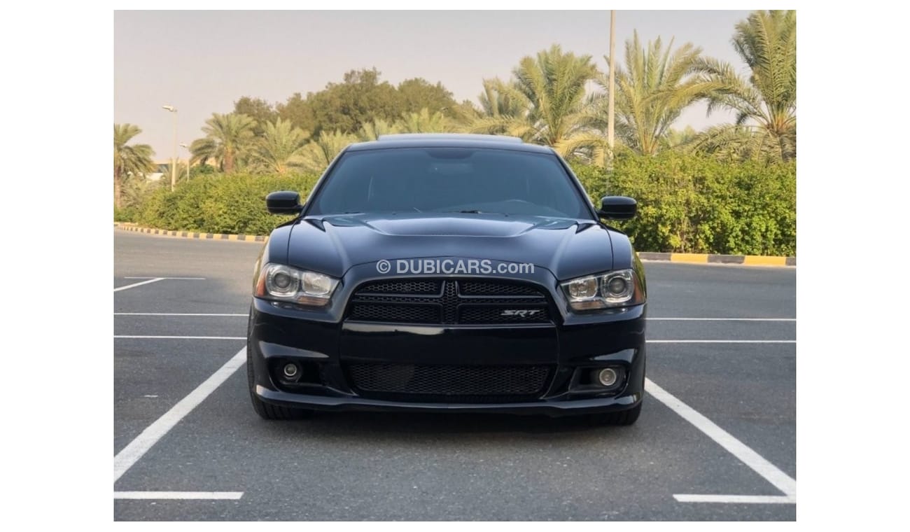 دودج تشارجر SRT8 موديل 2014 خليجي حاله ممتازه من الداخل والخارج فل مواصفات كراسي جلد ومثبت سرعه وتحكم كهربي كامل