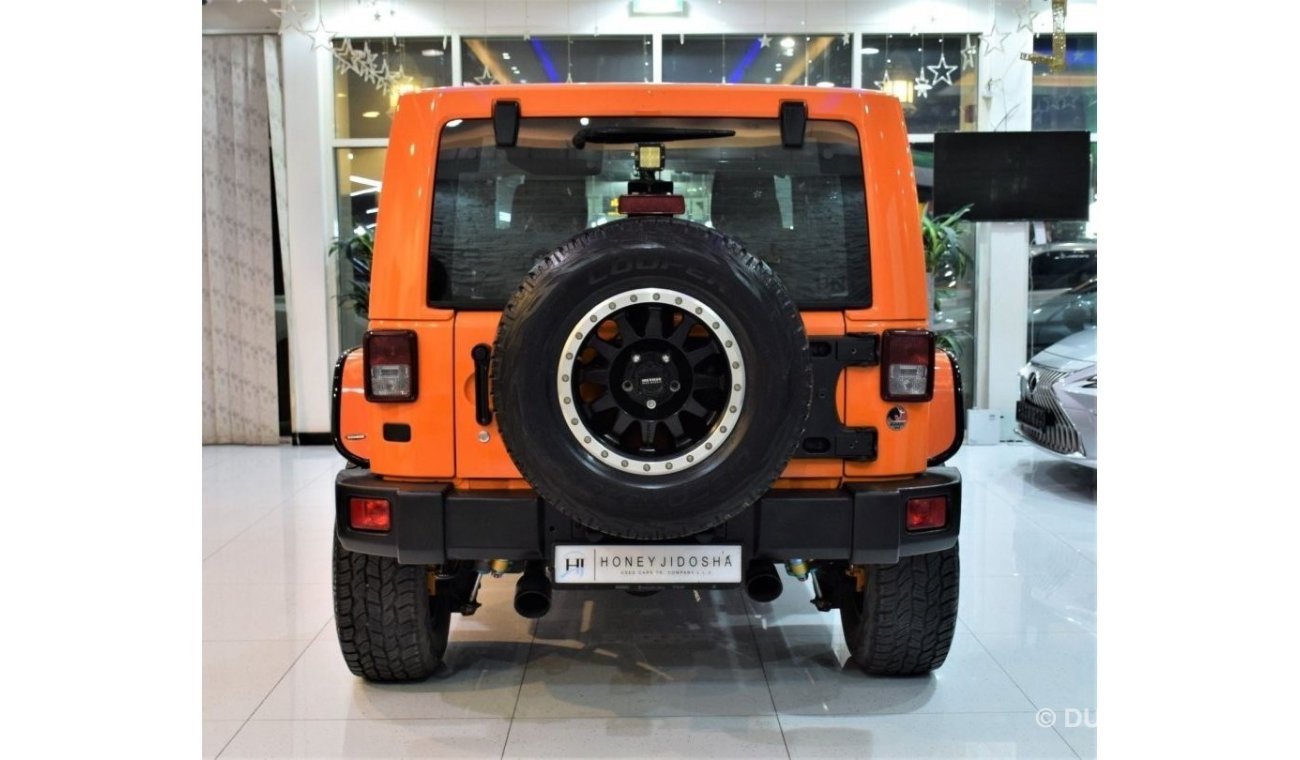 Jeep Wrangler EXCELLENT DEAL for our Jeep Wrangler SAHARA 2013 Model!! in Orange Color! GCC Specs