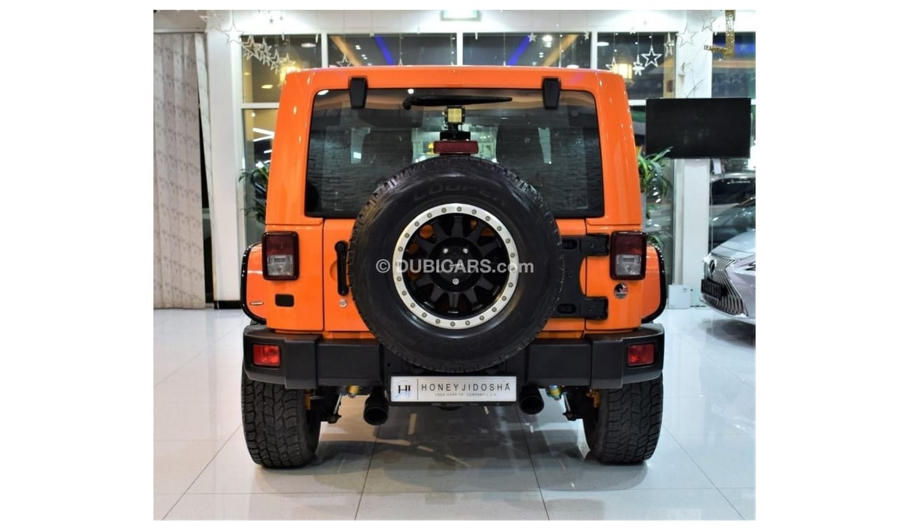 Jeep Wrangler EXCELLENT DEAL for our Jeep Wrangler SAHARA 2013 Model!! in Orange Color! GCC Specs