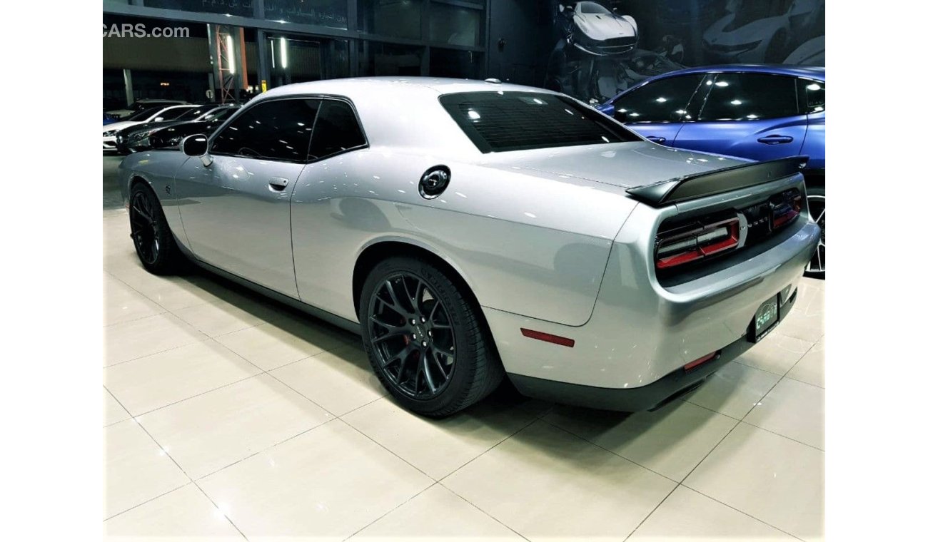 دودج تشالينجر CHALLENGER HELLCAT 707HP IN AMAZING CONDITION FULL SERVICE HISTORY AND FREE SERVICE CONTRACT 100K KM