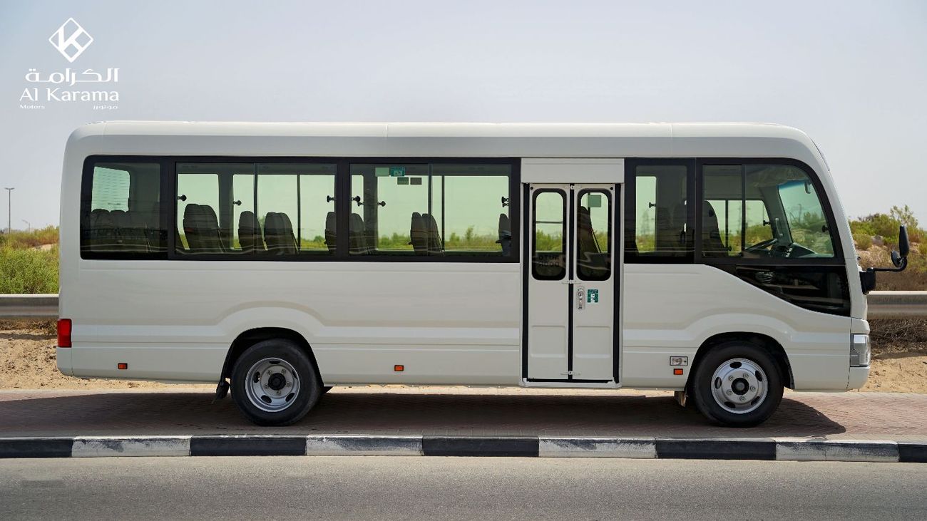 Toyota Coaster DLX - 4.2L Manual - 23 Seater Bus - Power Door - AC/Heater - Audio/AM/FM