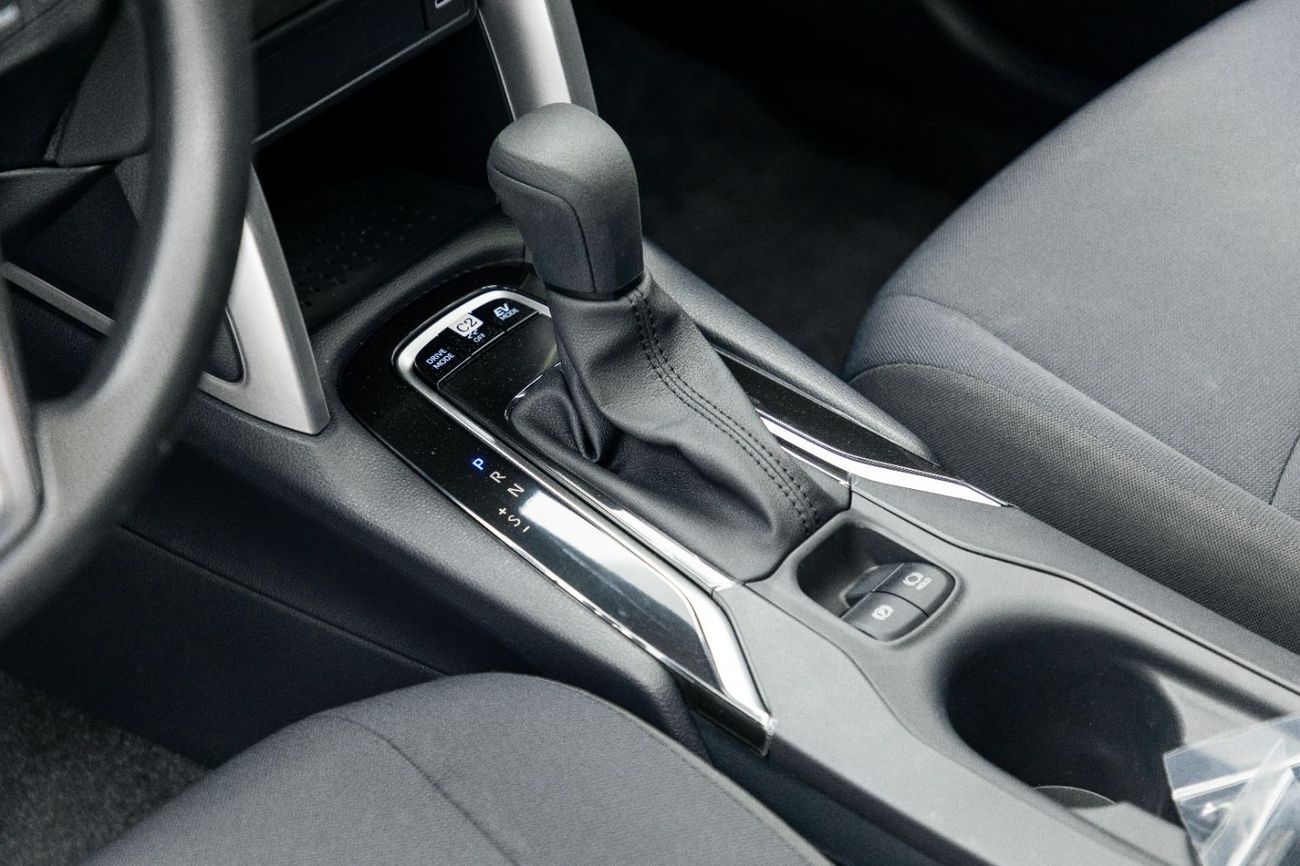 Toyota Corolla Cross Elite 2.0L - Hybrid - White Inside Black | Export Only