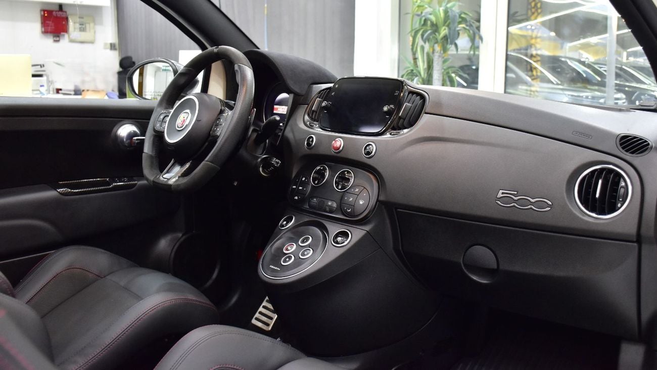 Abarth 595 EXCELLENT DEAL for our Abarth 595 Convertible Competizione ( 2022 Model ) in White Color GCC Specs