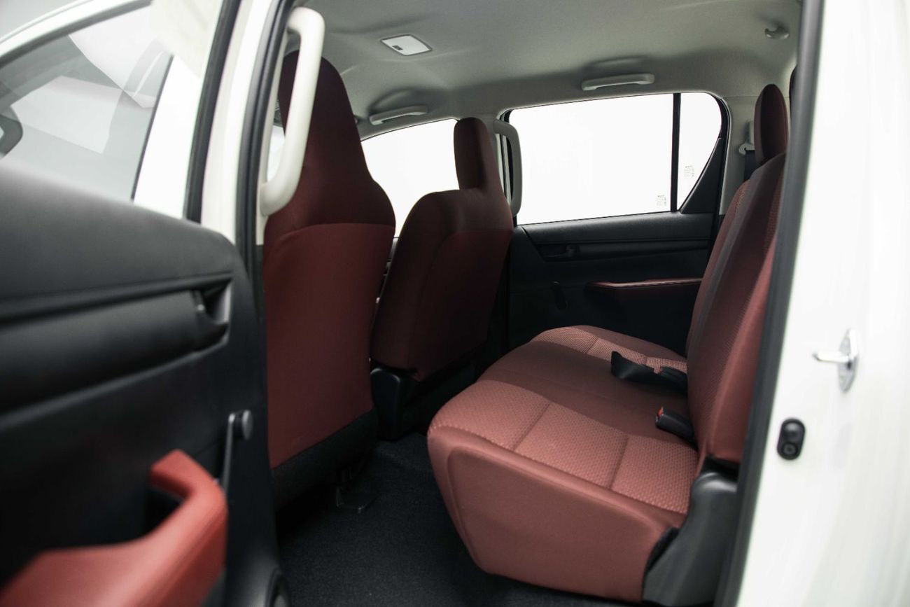 Toyota Hilux DLX 2.4L - Super White Inside Maroon | Export Only