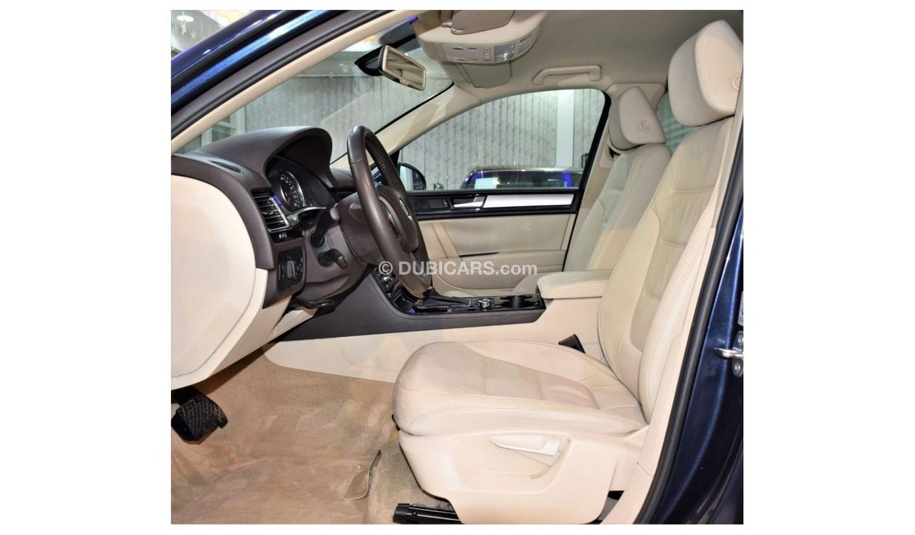 Volkswagen Touareg EXCELLENT DEAL for our Volkswagen Touareg ( 2011 Model! ) in Blue Color! GCC Specs