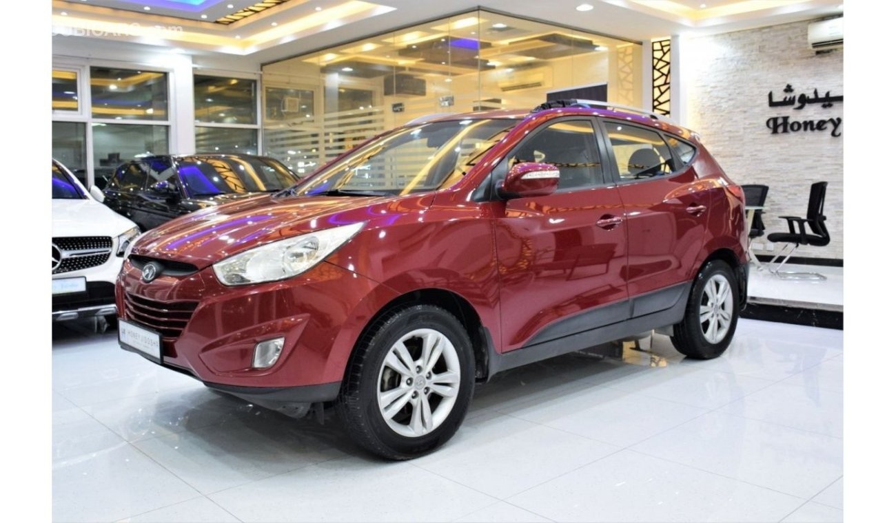 Hyundai Tucson GL EXCELLENT DEAL for our Hyundai Tucson 4WD ( 2012 Model! ) in Red Color! GCC Specs