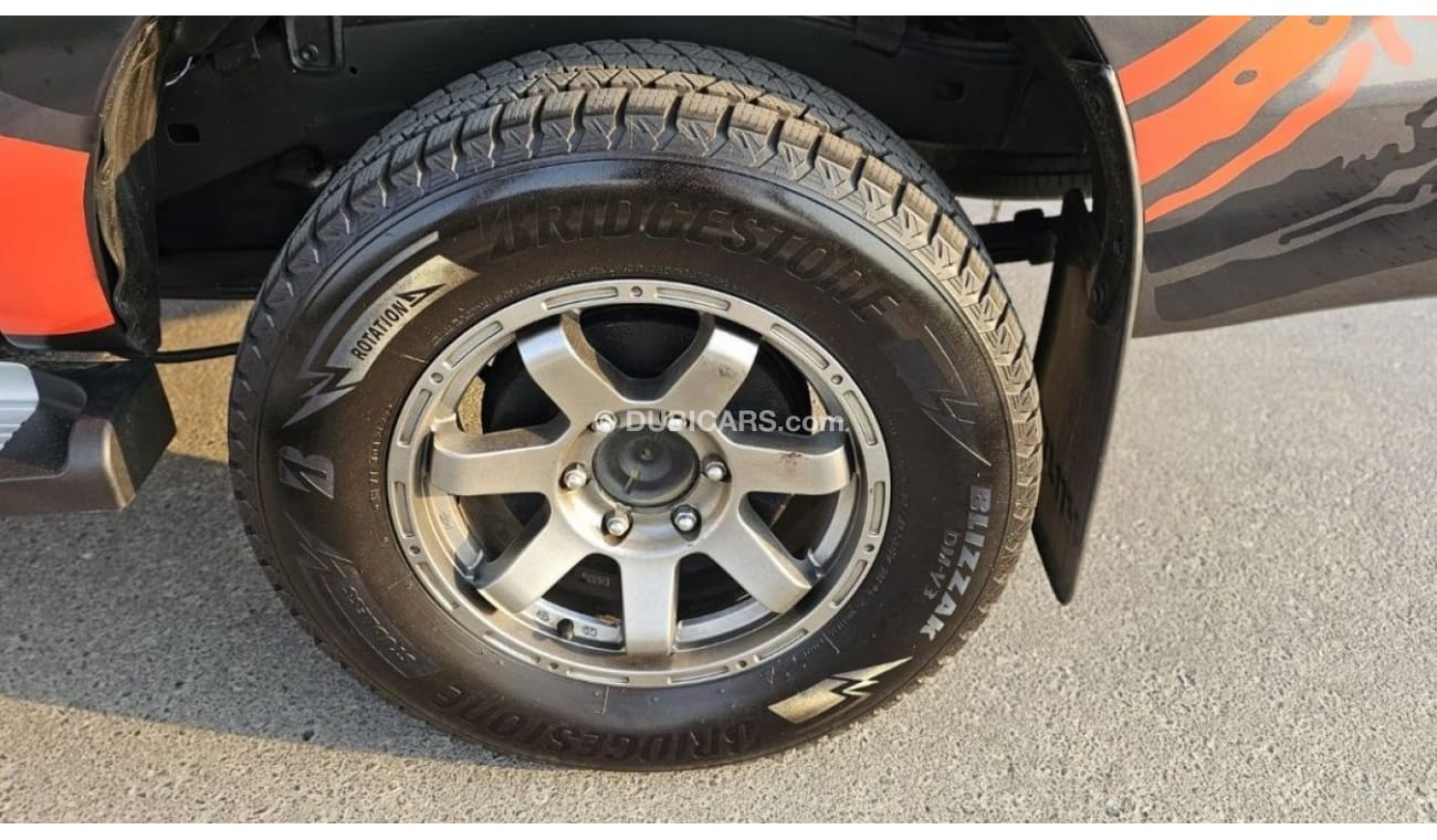 Toyota Hilux DIESEL 2KD | 2.5L ENGINE | LEFT-HAND-DRIVE | SIDE BODY STICKER | ALLOY RIMS | TINTED WINDOWS