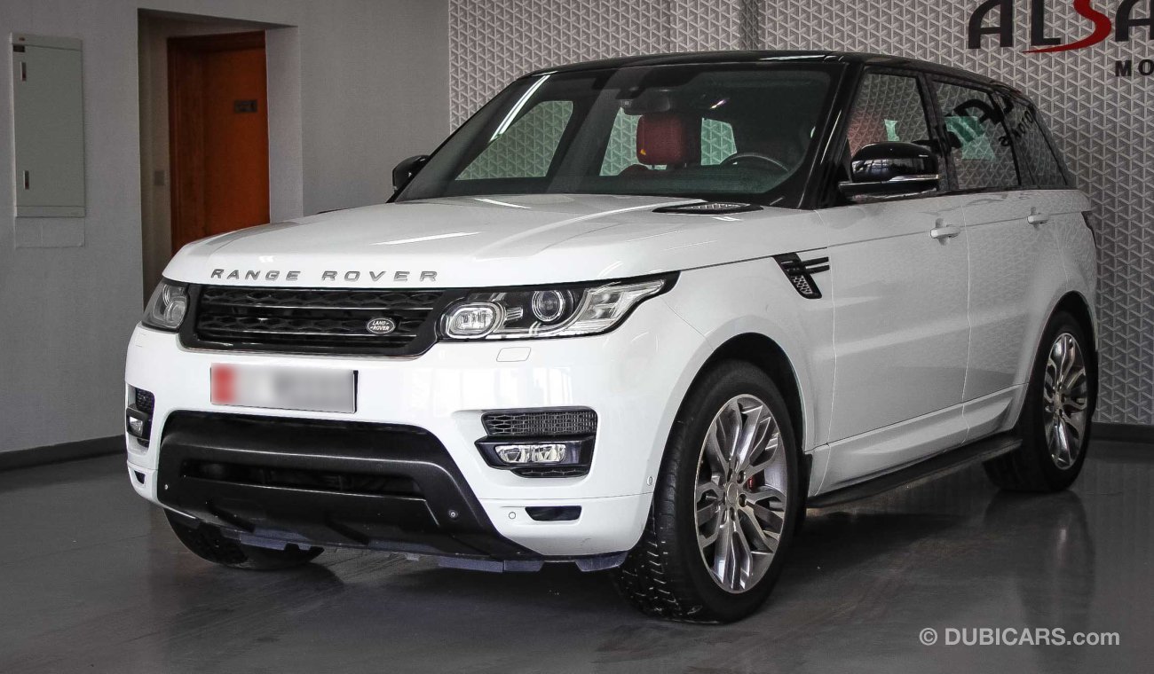 Land Rover Range Rover Sport Supercharged رنج روفر سبورت V8 2014 من وكالة الطاير  147000 كم لون ابيض و الداخل احمر بدون حوادث او صبغ تحت الضما