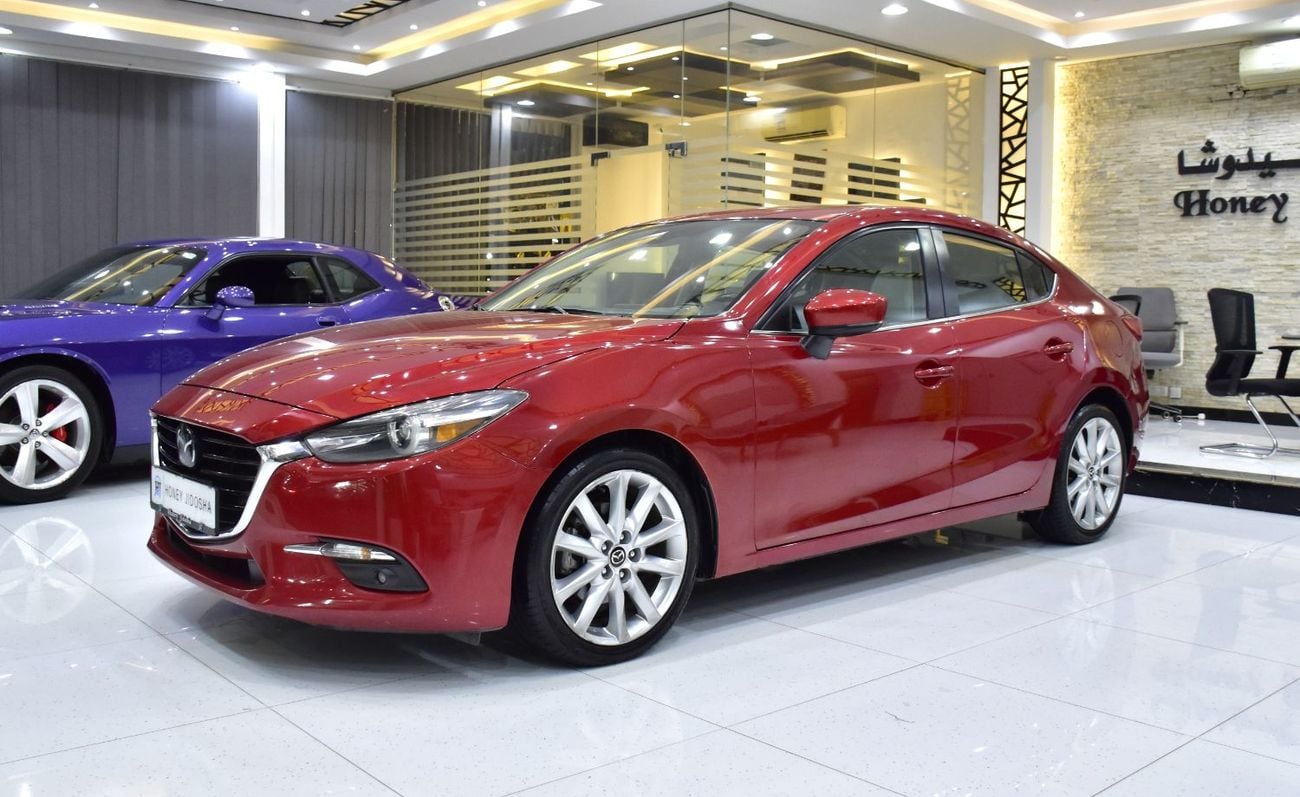 Mazda 3 EXCELLENT DEAL for our Mazda 3 ( 2017 Model ) in Red Color GCC Specs