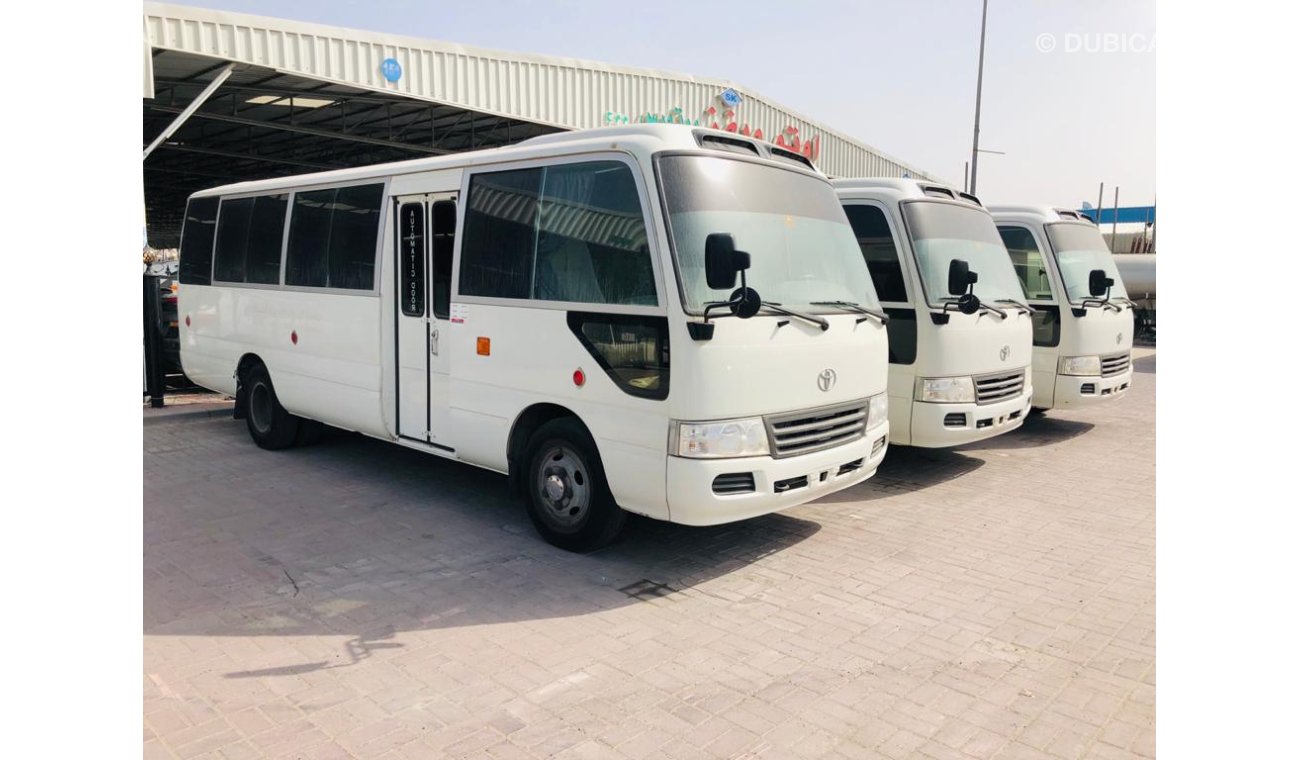 تويوتا كوستر 30 SEATER----4.2L-DIESEL----LIKE BRAND NEW----ESPECIALMENTE PARA ANGOLA