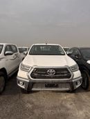 Toyota Hilux 2.7L - Super White Inside Red