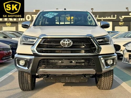 تويوتا هيلوكس SR5 / 2.7L V4 / M/T /  DVD + CAM / 4X4 / WOOD TRIM / FULL OPTION (CODE # 69026)