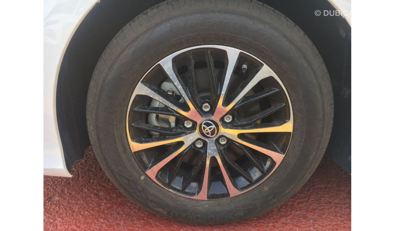 تويوتا كامري LE تويوتا كامري LE (AXVH71) 2.5 لتر سيدان هجين دفع أمامي 4 أبواب لون أبيض 2020 موديل دفع بدء ناقل حر