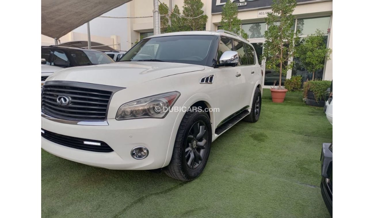 Infiniti QX56 Model 2011 imported, white color, leather opening, alloy wheels, sensors, speed stabilizer, in excel