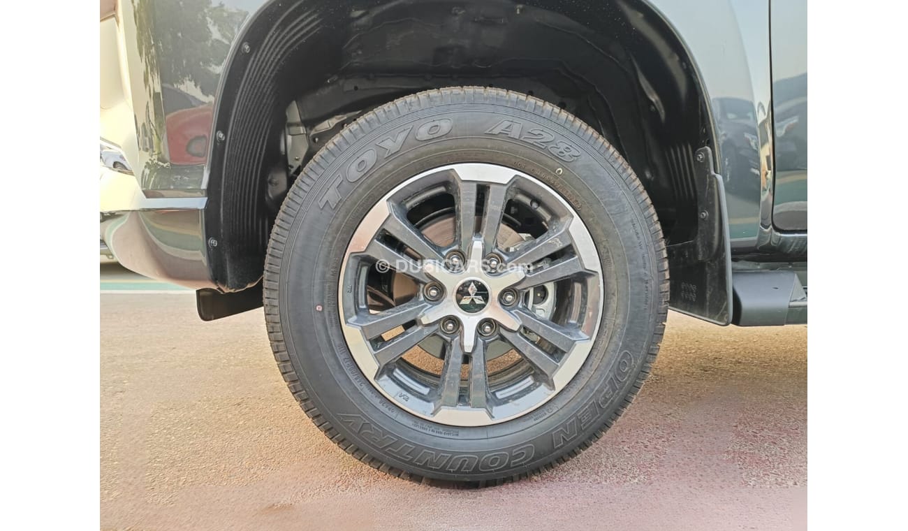 Mitsubishi L200 GLX 2.5L Diesel / M/T / 4WD / Black Rims / Streering Vol Control (Code # L2DDB)